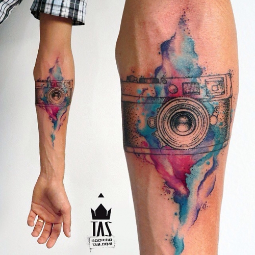 Awesome Watercolor Camera Tattoo On Forearm