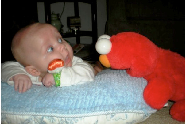 Baby Scared From Toy Funny Picture