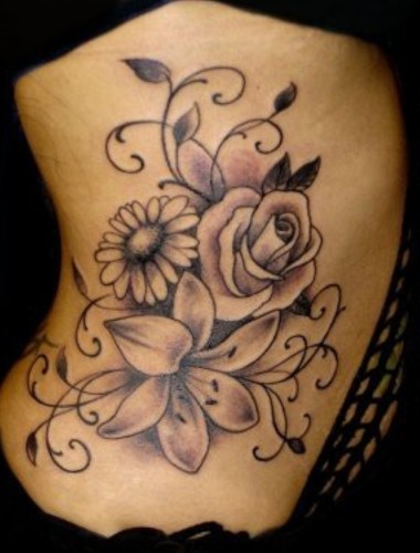 Black And Grey Flowers Tattoo Design For Side Rib