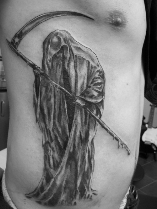 Black And Grey Grim Reaper Tattoo On Man Side Rib