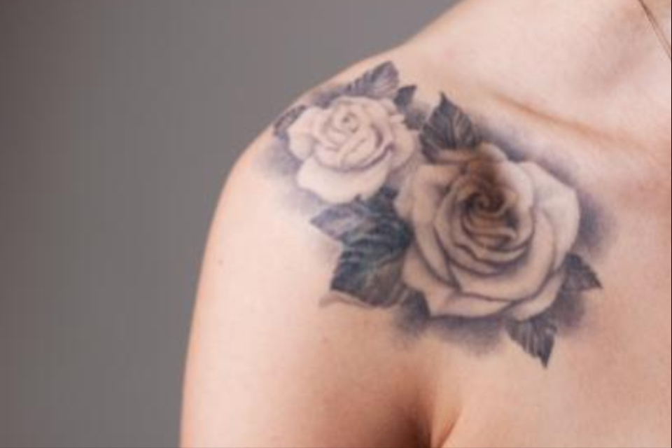 Black And White Rose Tattoo On Right Front Shoulder
