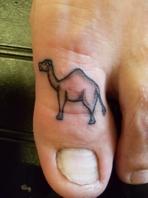 Black Camel Tattoo On Toe