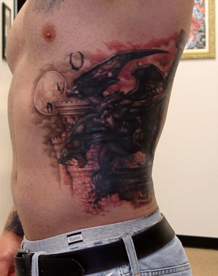 Black Ink Gargoyle Statue Tattoo On Man Side Rib