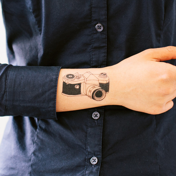 Black Old Camera Tattoo On Upper Wrist