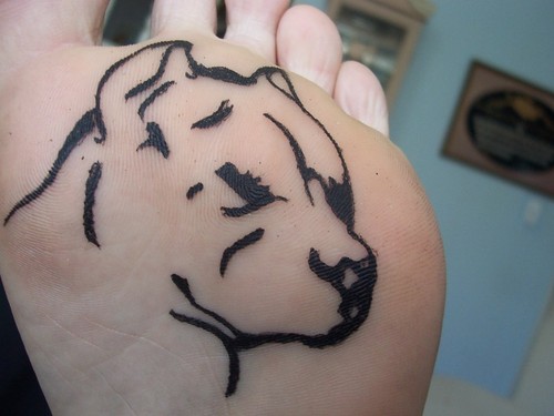 Black Pit Bull Dog Head Tattoo On Under Foot