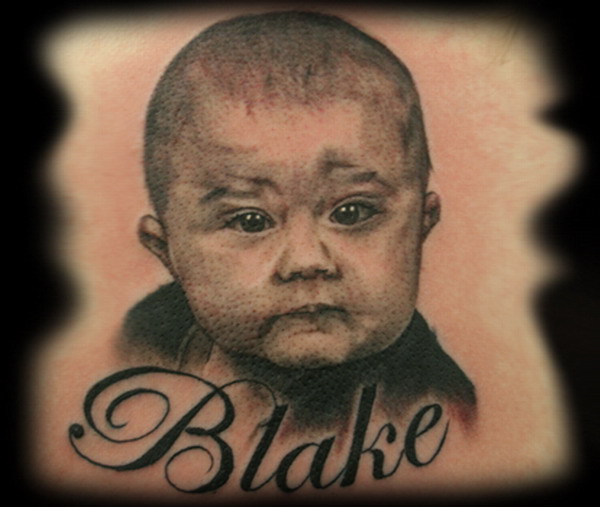 Blake - Black Ink Baby Portrait Tattoo Design By Jesse Rix