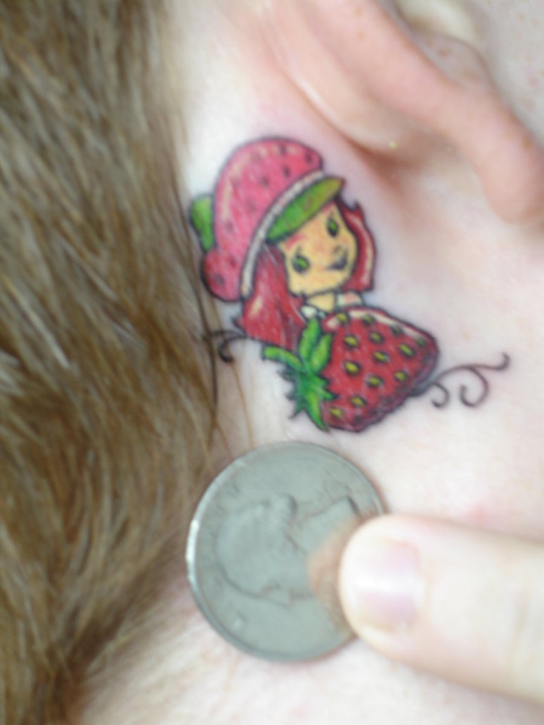 Cartoon Girl With Strawberry Tattoo On Behind The Ear
