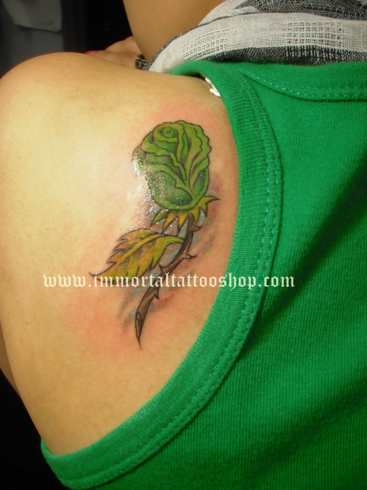 Green Rose Tattoo On Left Back Shoulder