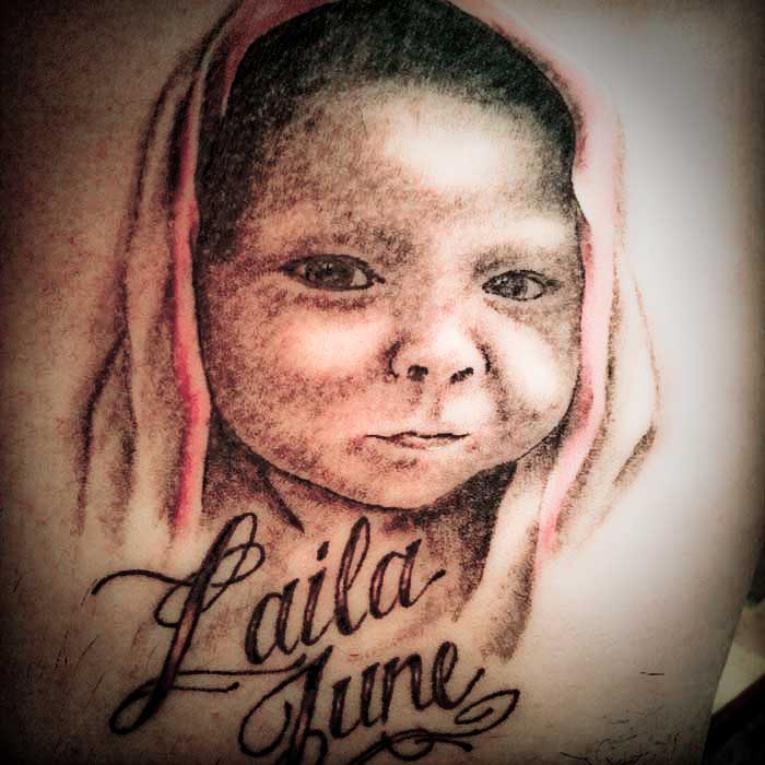 Laila June - Black Ink Baby Portrait Tattoo Design