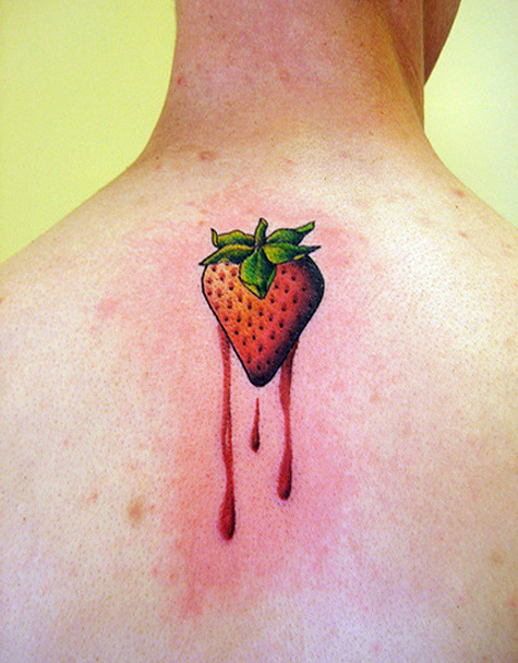 Melting Strawberry Tattoo On Upper Back