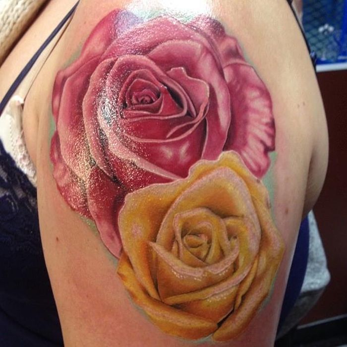 Pink And Yellow Two Roses Tattoo On Left Shoulder
