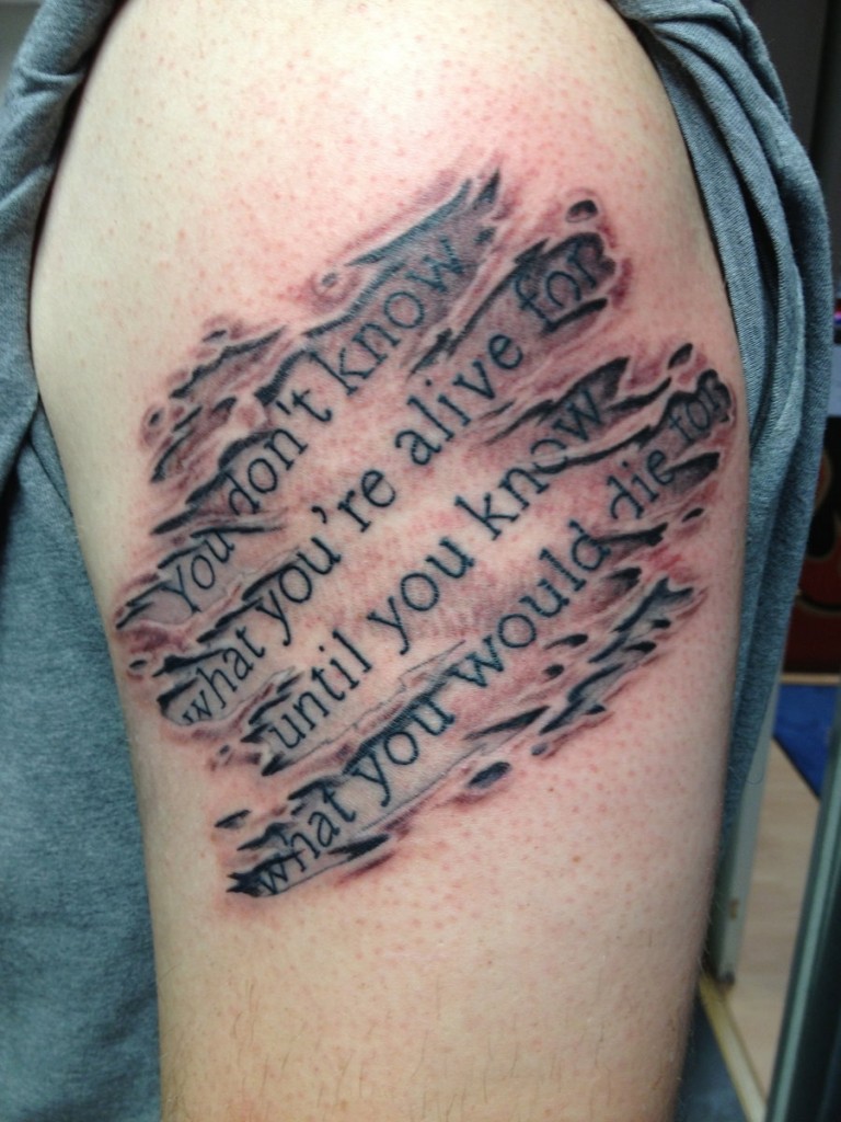 Quote In Torn Skin Tattoo On Left Shoulder By Andrew govan
