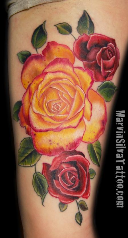 Red And Yellow Roses Tattoo On Thigh