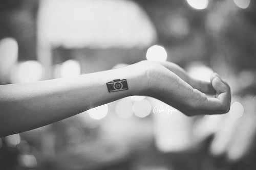 Simple Black Camera Tattoo On Side Wrist
