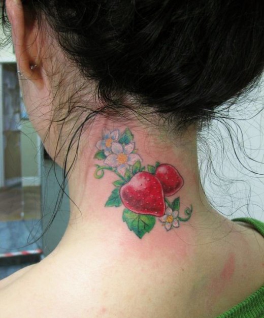 Strawberries With Flowers Tattoo On Girl Back Neck