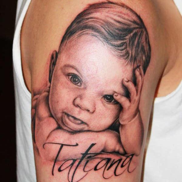 Tatiana - Baby Portrait Tattoo On Right Shoulder