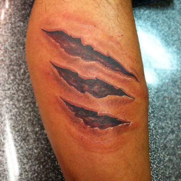 Torn Skin Paw Scratches Tattoo Design For Leg By David Meek