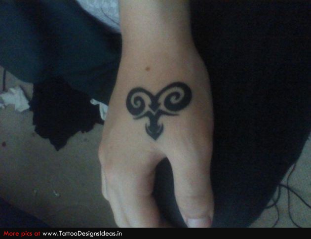 Unique Black Aries Head Tattoo On Hand
