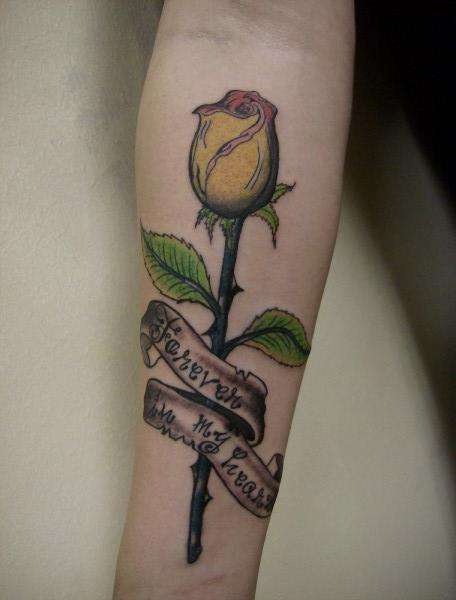 Yellow Rose With Banner Tattoo On Forearm