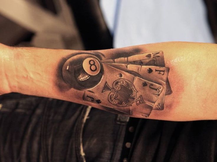 3D Eight Ball With Playing Cards Tattoo On Forearm