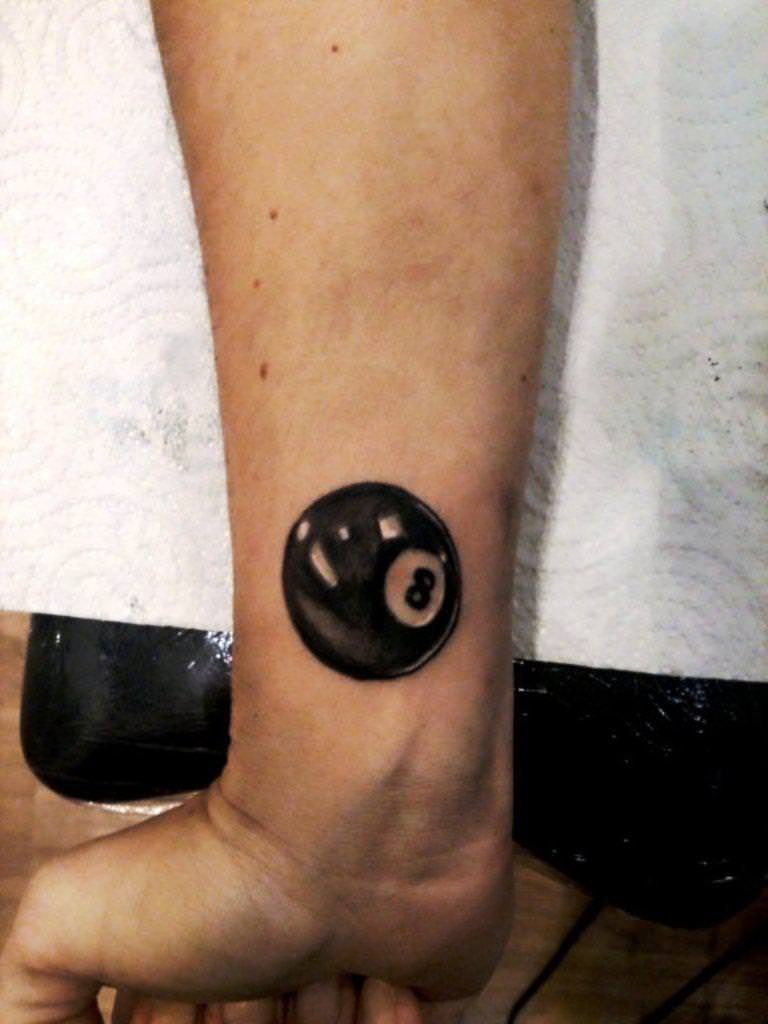 Amazing Black Eight Ball Tattoo On Wrist By Vampyria