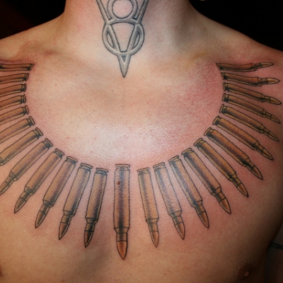Amazing Bullets Tattoo On Man Chest