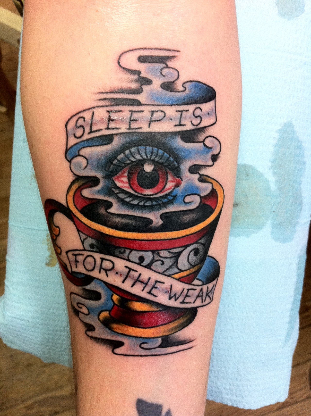Amazing Coffee Cup With Banner And Eye Tattoo Design For Arm