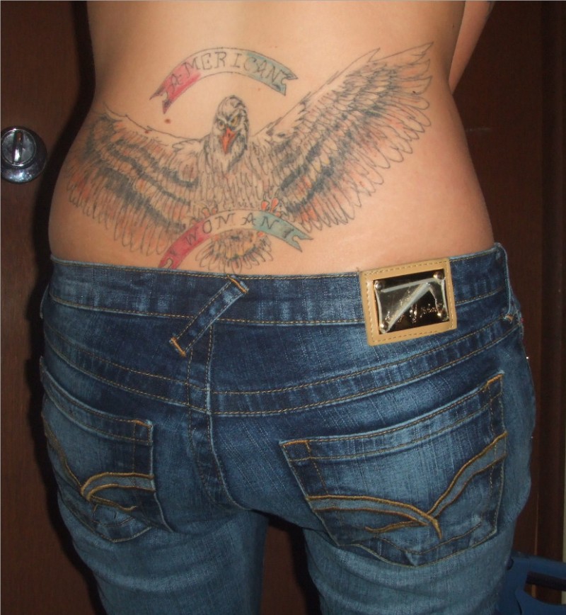 Amazing Patriotic Eagle With Banner Tattoo On Lower Back