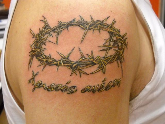 Amazing Thorns Crown Tattoo On Man Right Shoulder