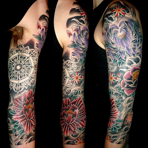 Artistic Flowers Sleeve Tattoo