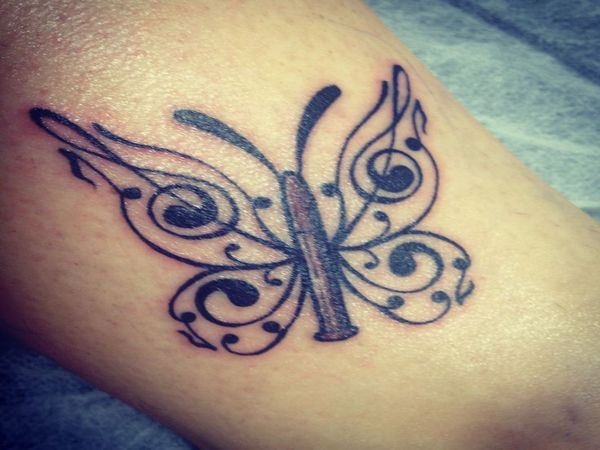 Awesome Bullet Butterfly Tattoo Design