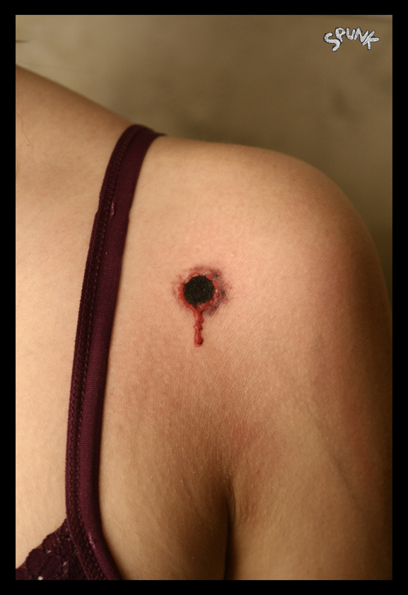 Awesome Bullet Hole Tattoo On Left Front Shoulder
