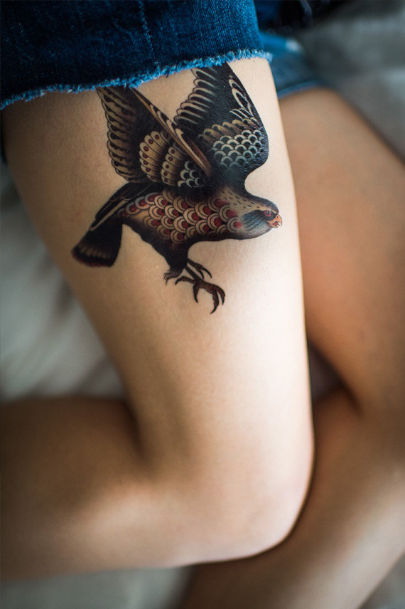 Awesome Flying Falcon Tattoo On Girl Thigh By Jon Garber