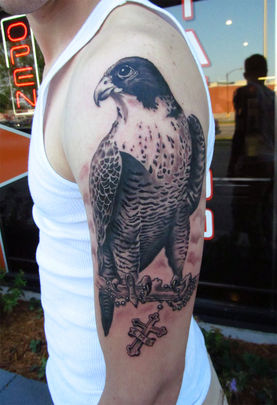 Black And Grey Falcon With Rosary Cross Tattoo On Right Half Sleeve