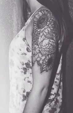 Black And Grey Flowers Tattoo On Sleeve