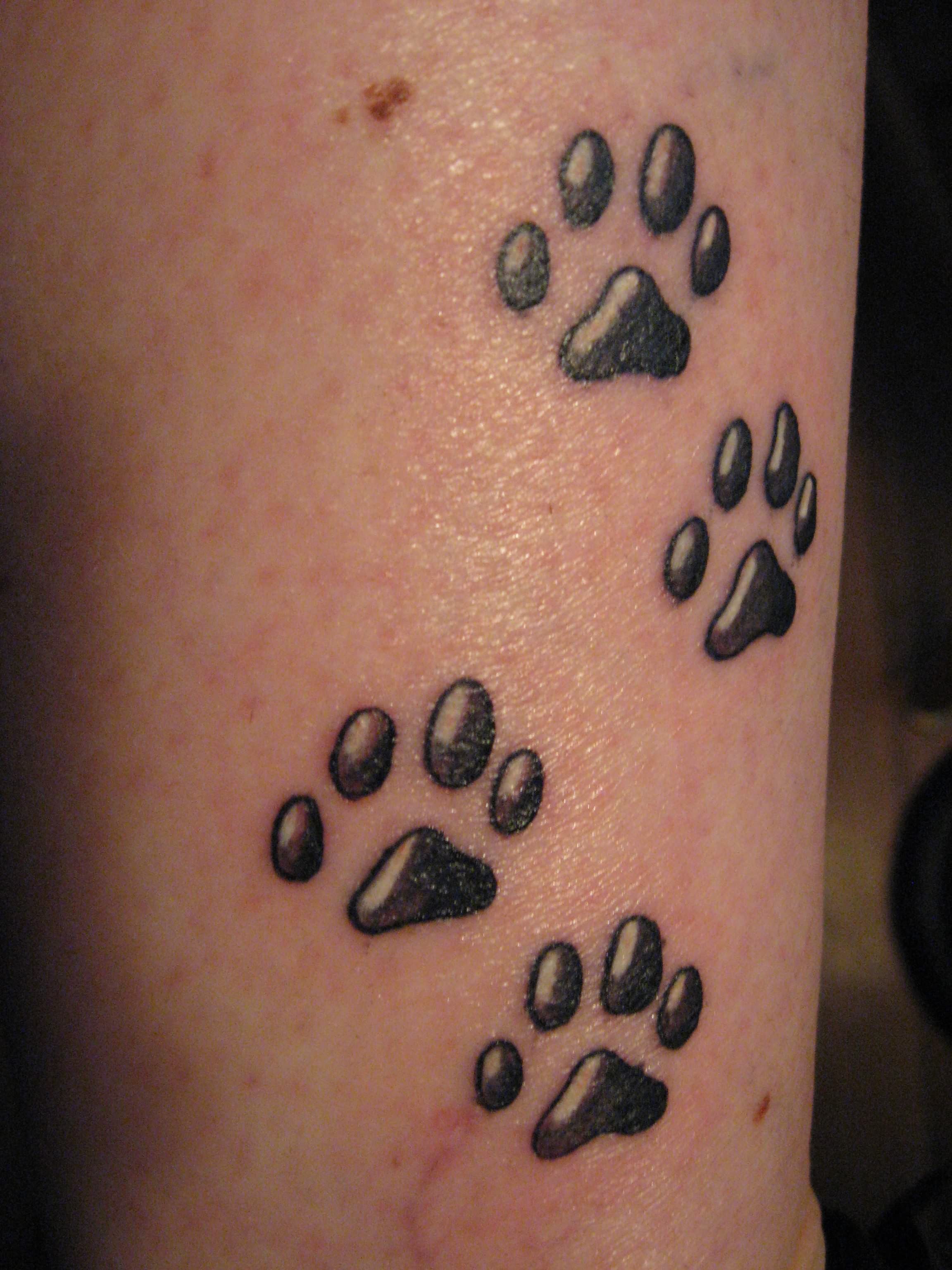 Black And Grey Leopard Paw Print Tattoo