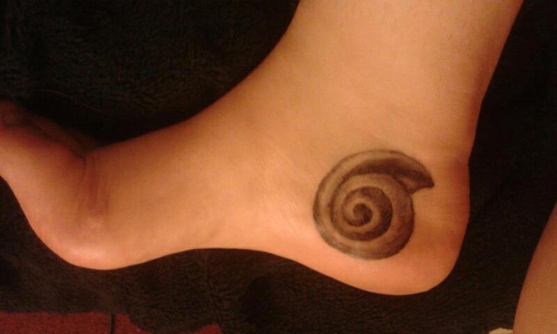Black And Grey Nautilus Shell Tattoo On Heel By Annie Candore