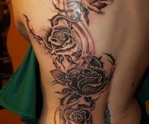 Black And Grey Roses With Thorns Tattoo On Full Back