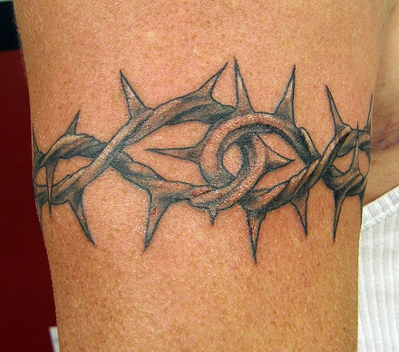 Black And Grey Thorns Tattoo On Bicep Arm Band