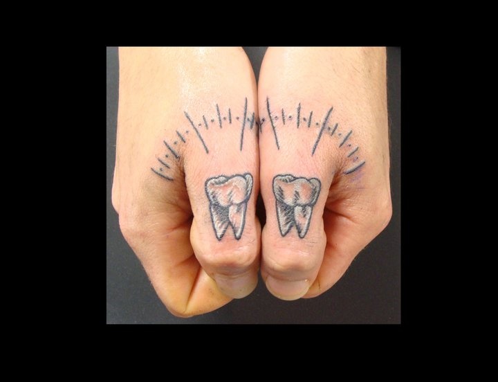 Black And Grey Two Teeth Tattoo On Both Hand