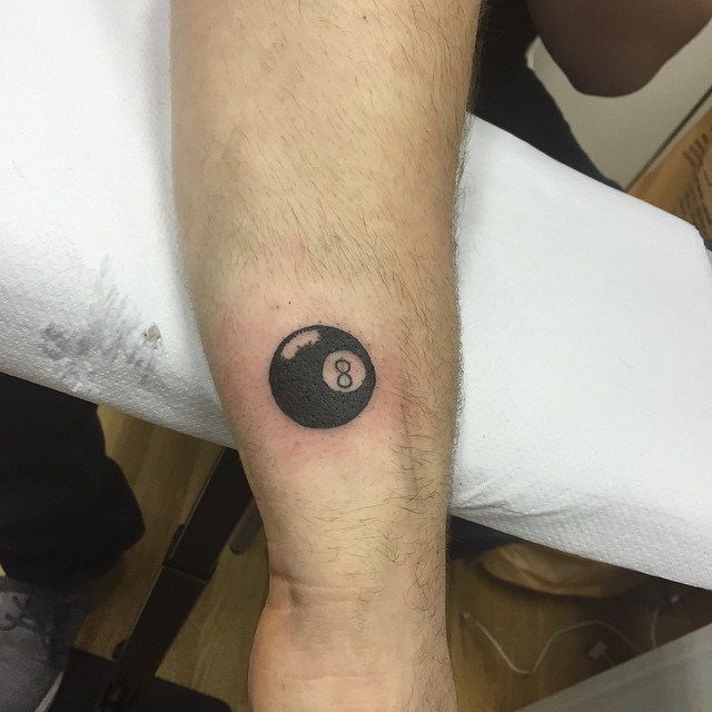 Black Eight Ball Tattoo On Side Wrist