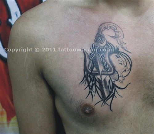 Black Ink Lord Shiva With Trishul Tattoo On Man Chest
