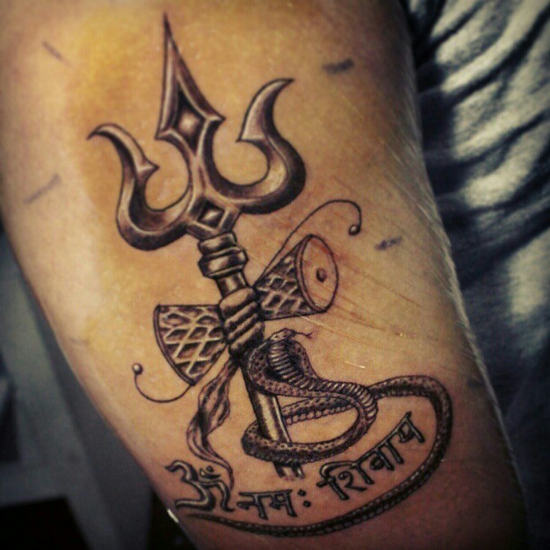 Black Ink Trishul With Pellet Drum And Snake Tattoo Design