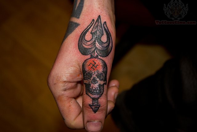 Black Ink Trishul With Skull Tattoo On Hand
