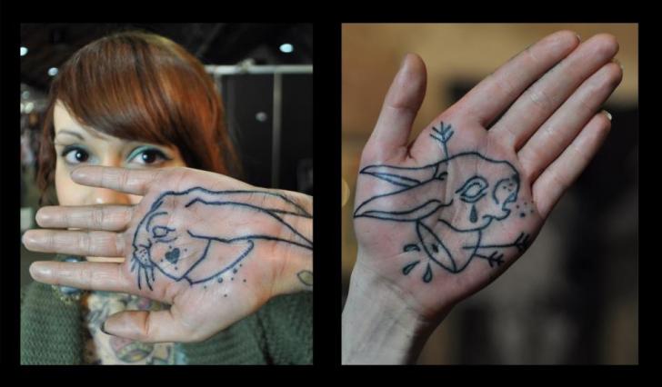 Black Outline Rabbit Tattoo On Girl Hand Palm By Mark Halbstark