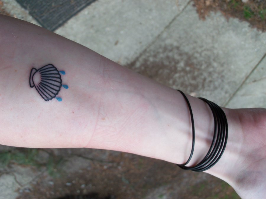 Black Outline Scallop Shell Tattoo On Forearm By Josh