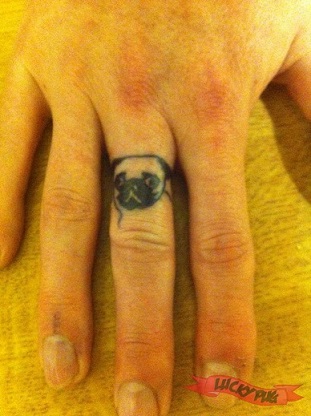 Black Pug Face Tattoo On Finger By Cheryl