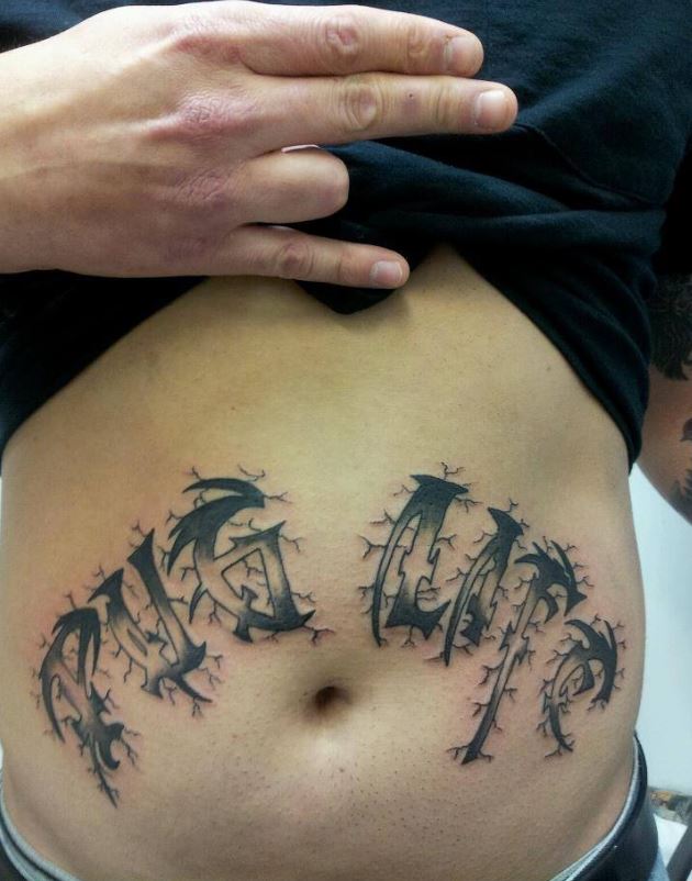 Black Tribal Pug Life Lettering Tattoo On Stomach