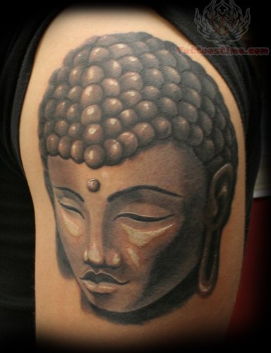 Buddha face tattoo on Shoulder