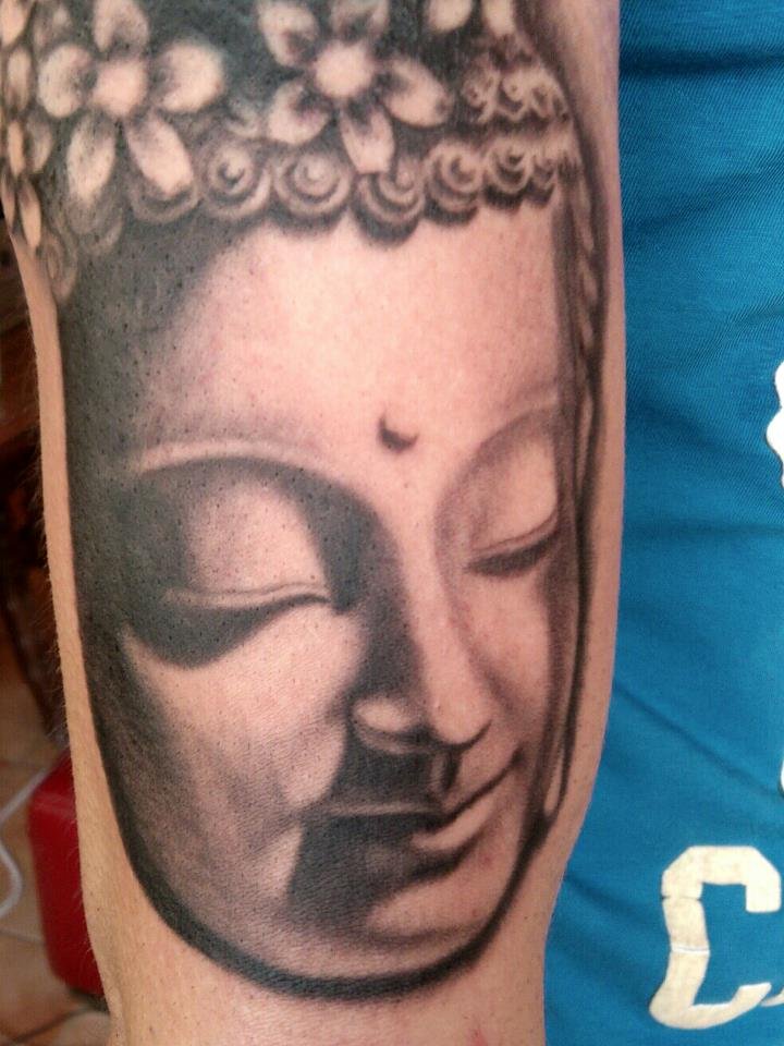 Buddha head tattoo design on half sleeve